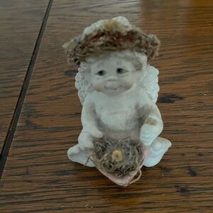 Adorable Cream Angel Figurine with Nest